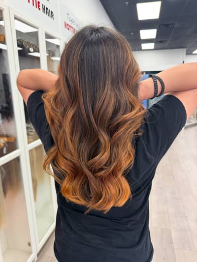 Golden copper balayage transformation! Dimensional highlights + gorgeous waves