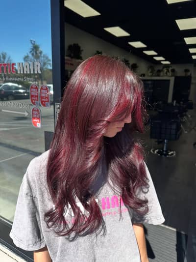 Bold Red Highlights Hair Transformation